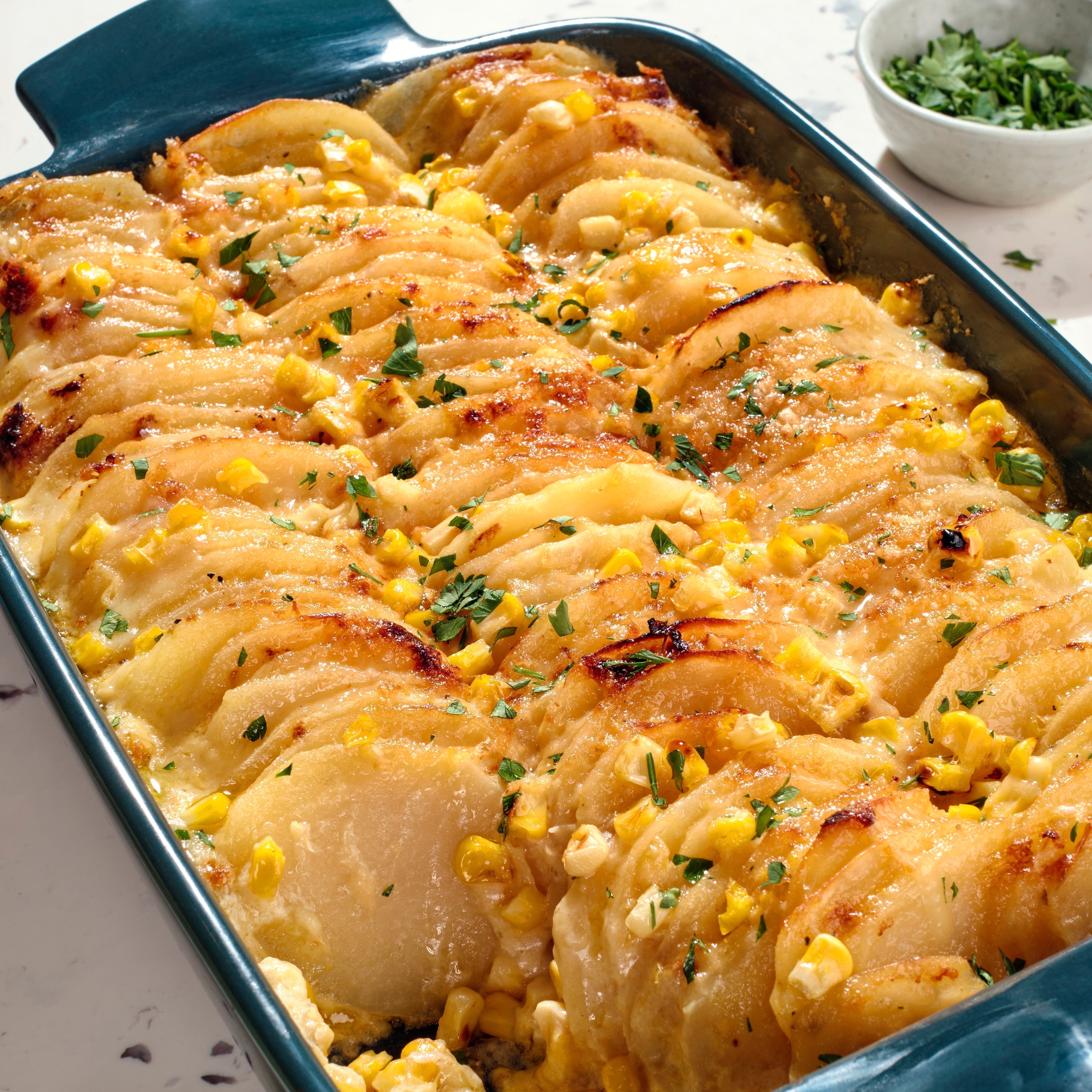 Cheesy Hasselback Potato Gratin with Corn & Truffle