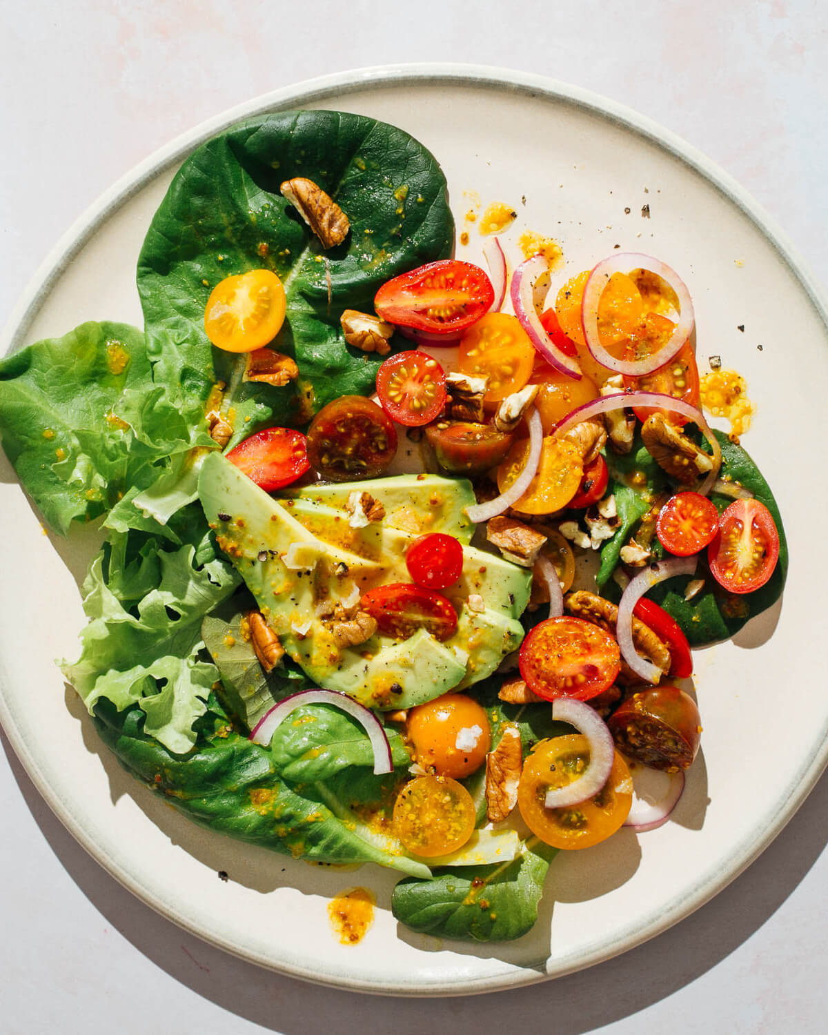 Cherry Tomato & Avo Salad With Pecans & Honey-Lemon Dressing